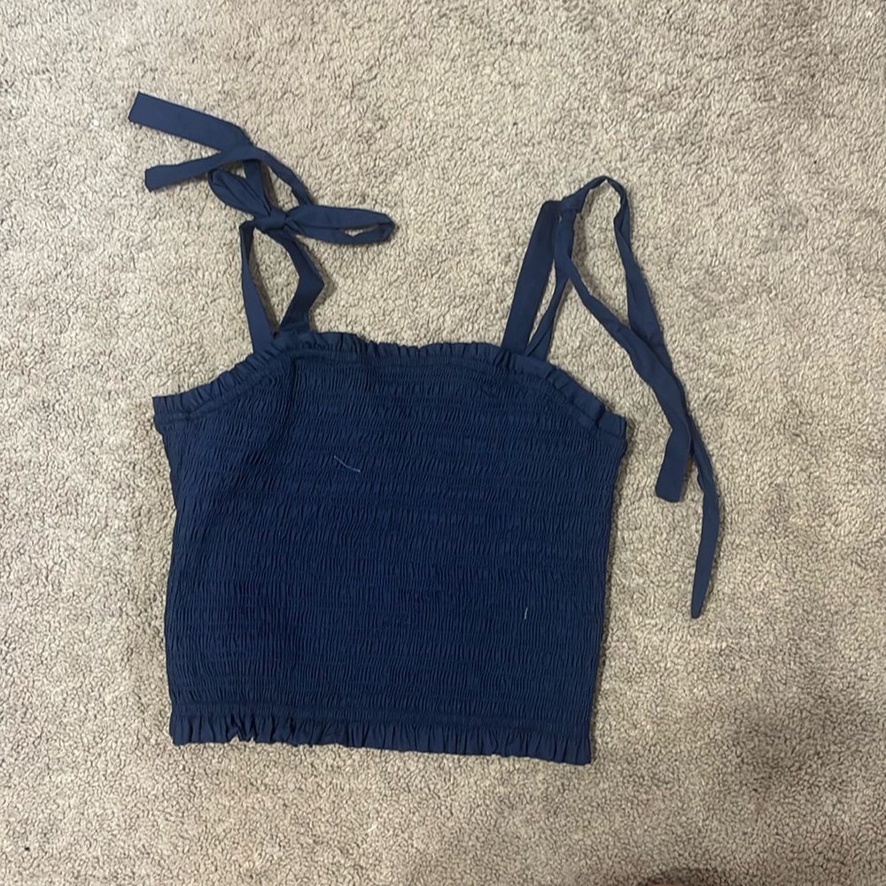 Navy blue, ruffled tank top. Never worn